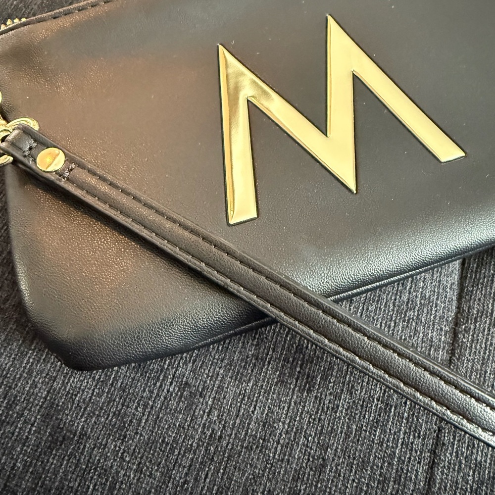 Carpisa Chic Black and Gold Wristlet “M”